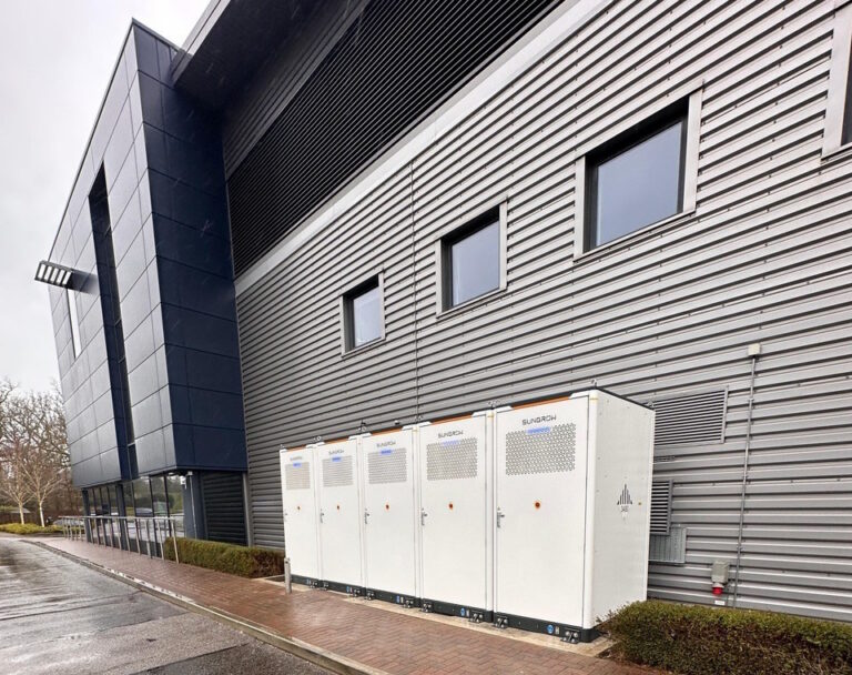 AJW's Sungrow commercial battery storage system beside their headquarters